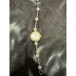 Rumours Quartz Women's Dress Watch Mother of Pearl Dial Rhinestone need battery